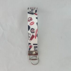 🆕 Stylish White Keychain with Makeup Print